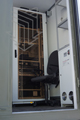 Шкаф-контейнер для оборудования, чувствительного к вибрации. Установлен на виброопорах, позволяющих выдерживать большие нагрузки при транспортировке оборудования.
